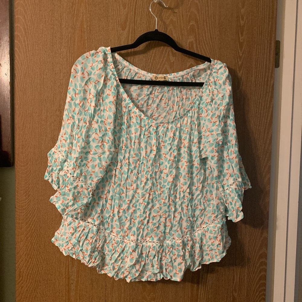 Democracy green, white, and orange apple print blouse